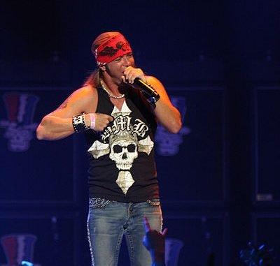 Bret Michaels sings on stage.