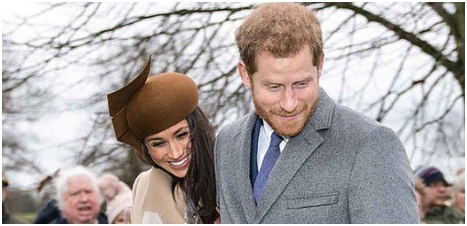 meghan markle and prince harry happily hug.