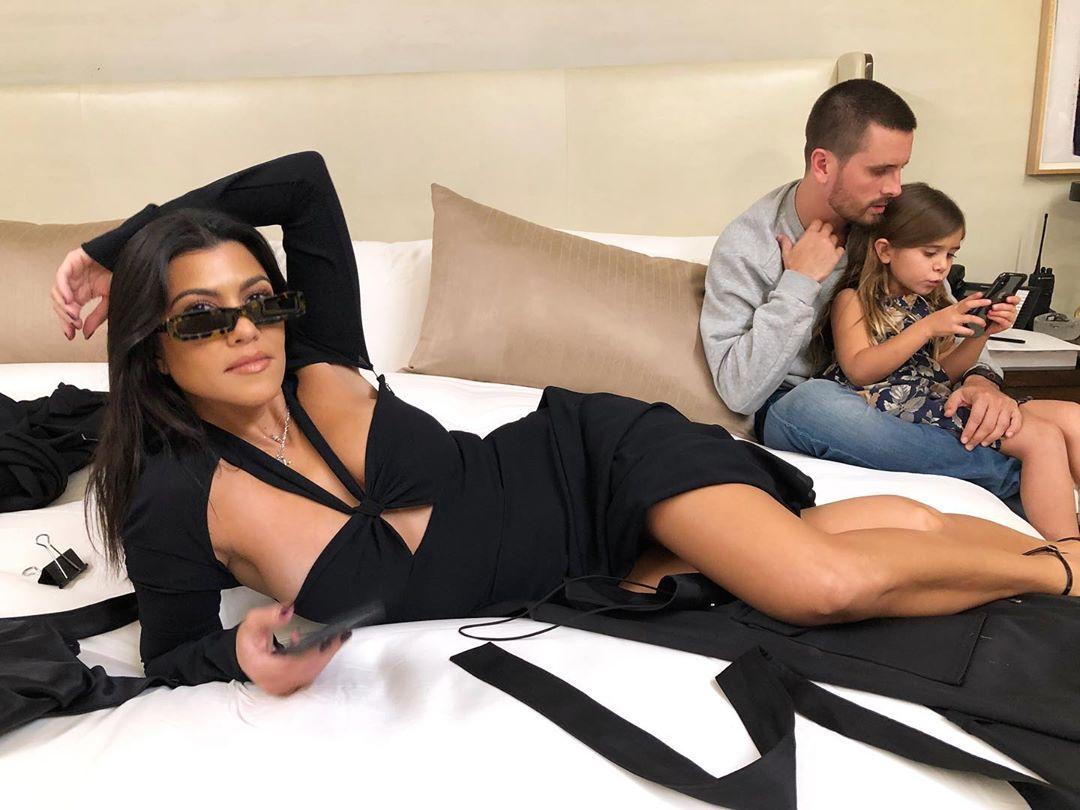 Kourtney Kardashian and Scott Disick in bed.