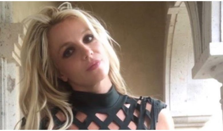 Britney Spears wears a black dress on Instagram.