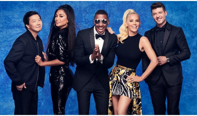 The Masked Singer judges Ken Jeong, Nicole Scherzinger, Jenny McCarthy, and Robin Thicke with host Nick Cannon.