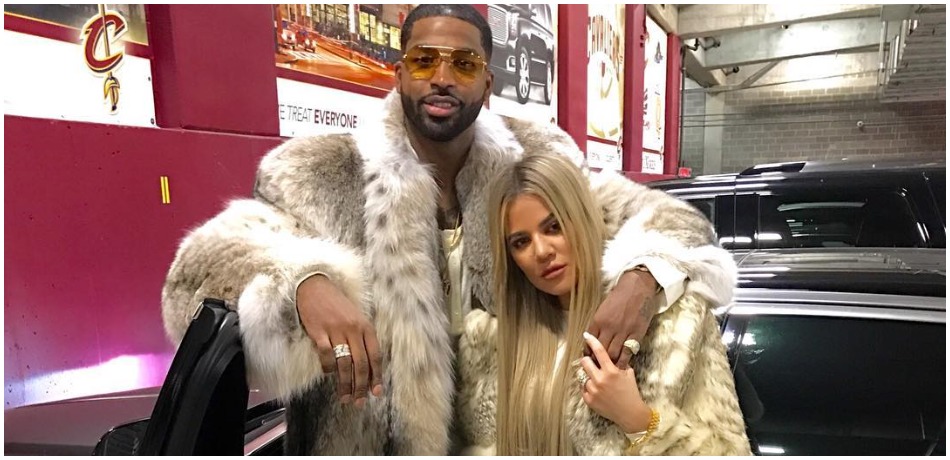 Khloe Kardashian and Tristan Thompson cuddle up for a photo.