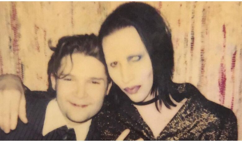 Corey Feldman and Marilyn Manson pose for a photo together.