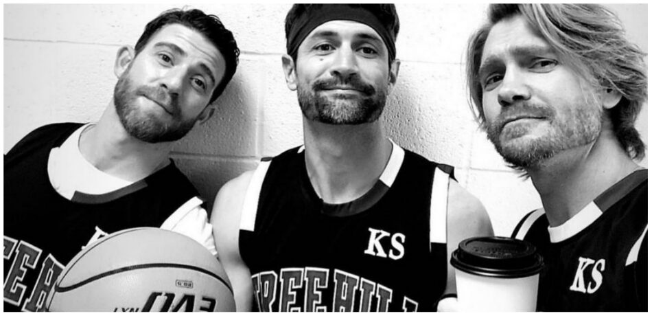 Bryan Greenberg, James Lafferty, and Chad Michael Murray during One Tree Hill charity basketball game.