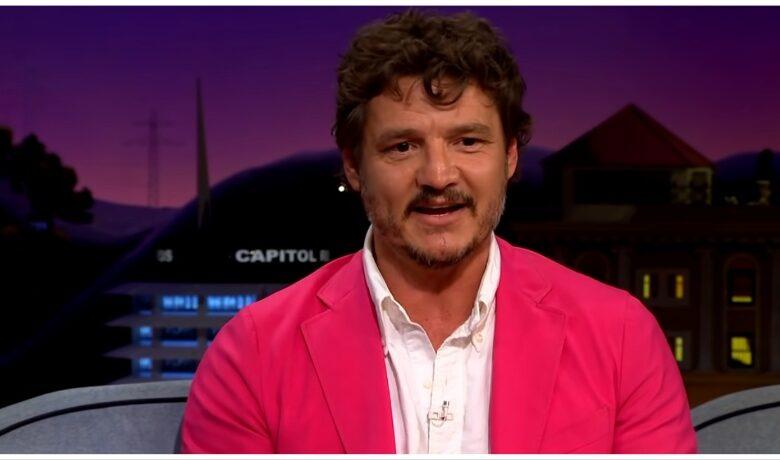 Pedro Pascal wearing a pink suit.