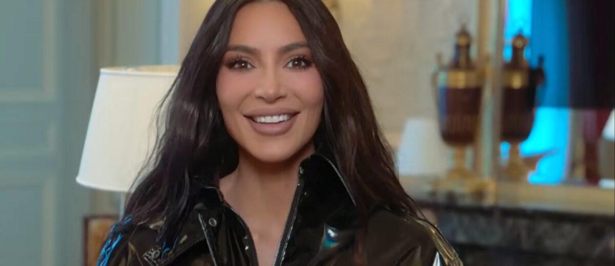 Kim Kardashian smiles in leather outfit