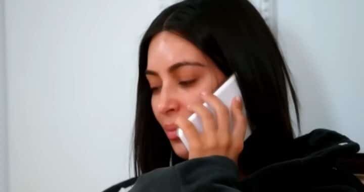 Kim Kardashian crying on the phone.