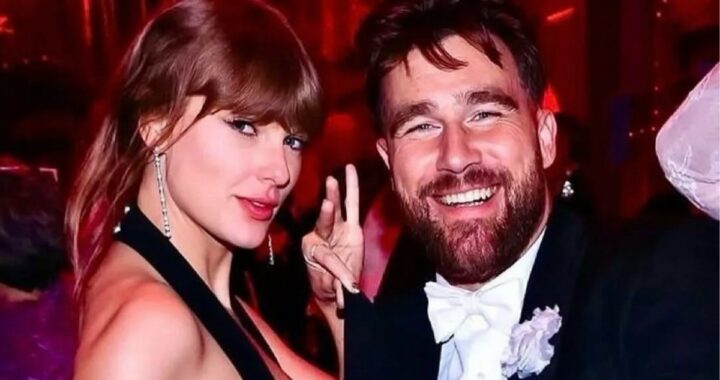 Taylor Swift and Travis Kelce pose for a photo