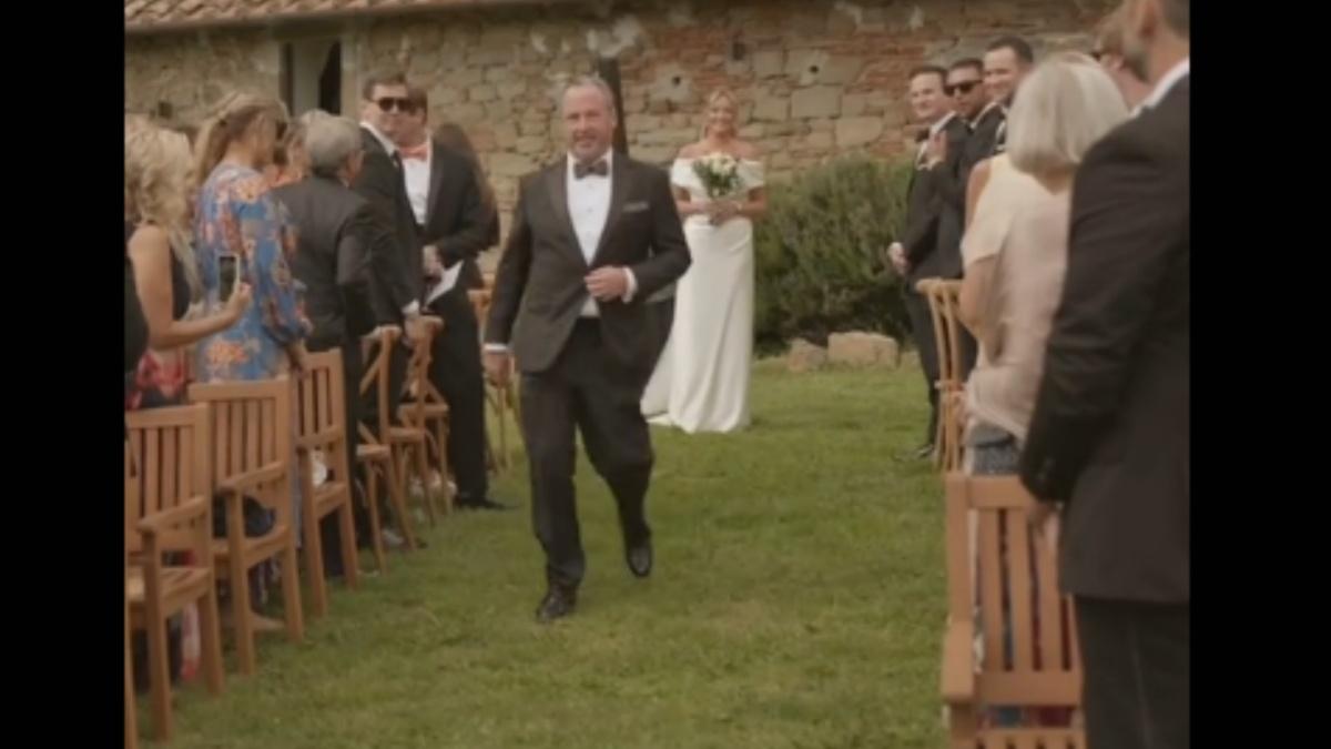 Florida bride escorted by two dads
